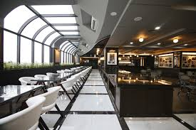 Lune dining hall with curved glass windows