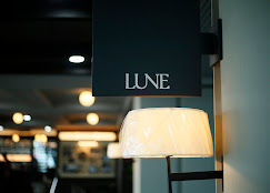 Lune restaurant signage and warm interior lighting